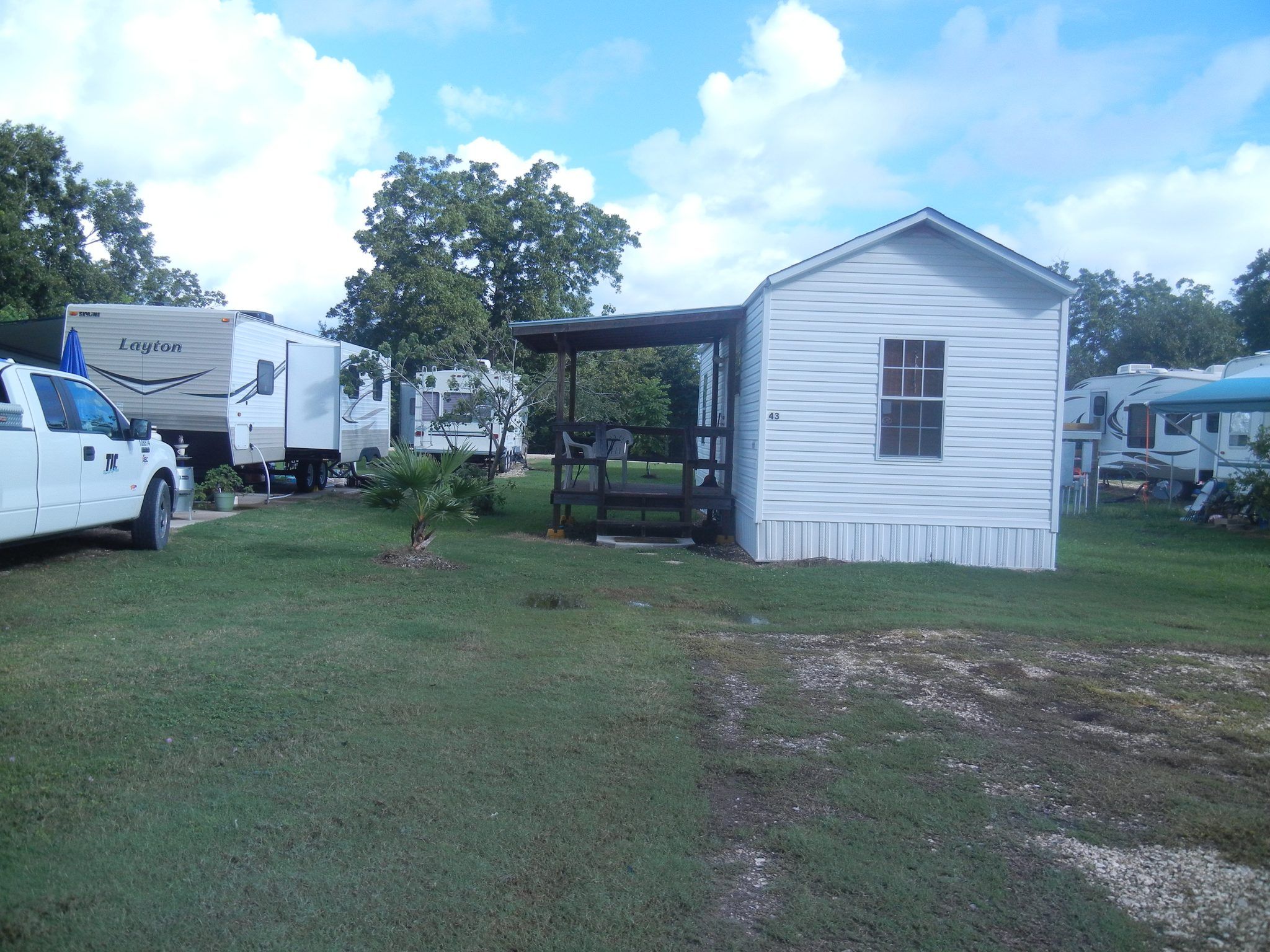 Park building and RV sites at San Bernard River RV Park